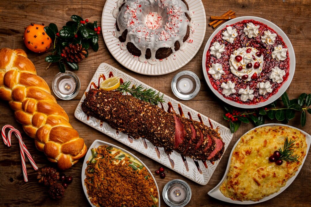 Traditional Czech festive dinner table with roasted meat and dumplings